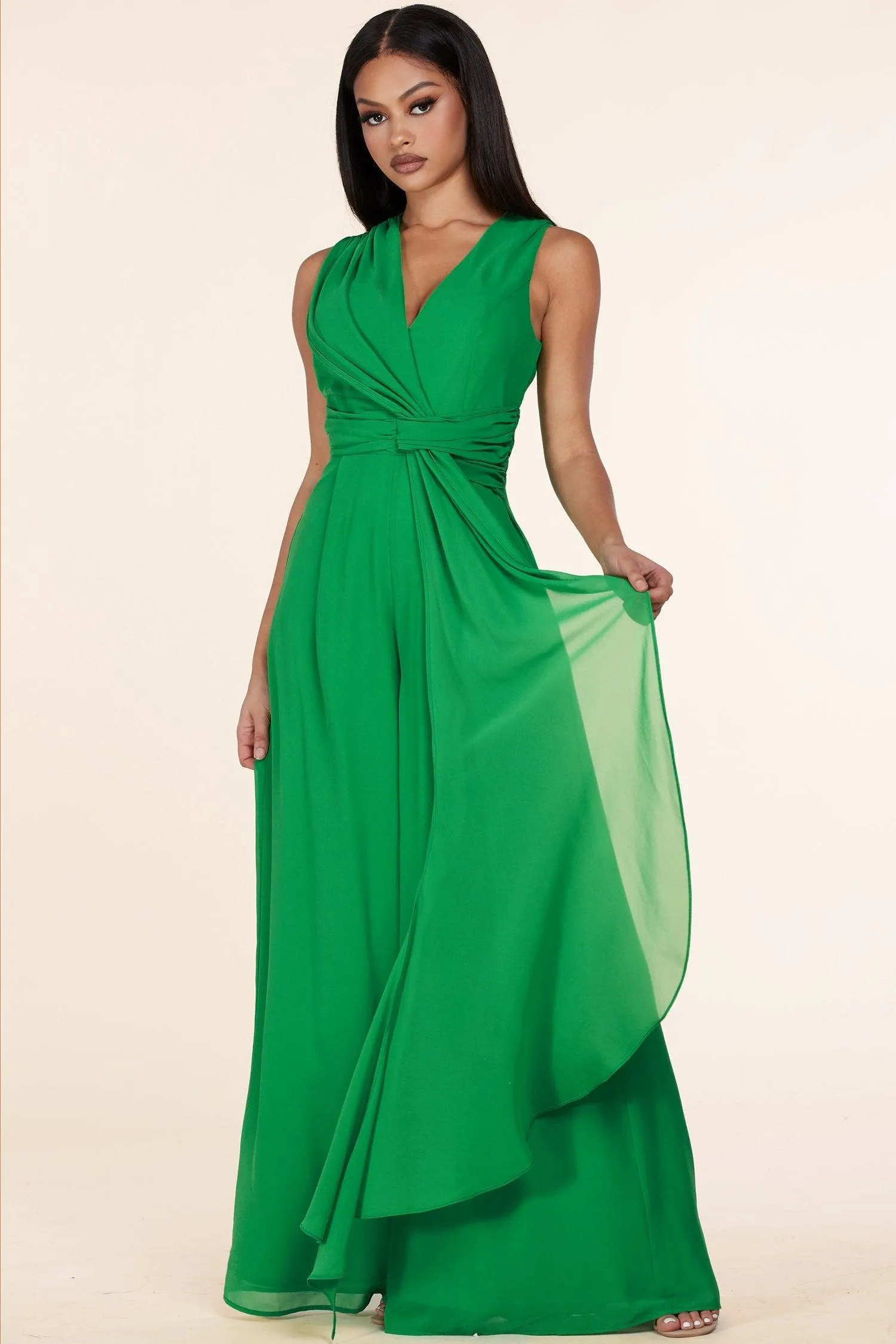 GREEN JUMPSUIT WITH A FLARE