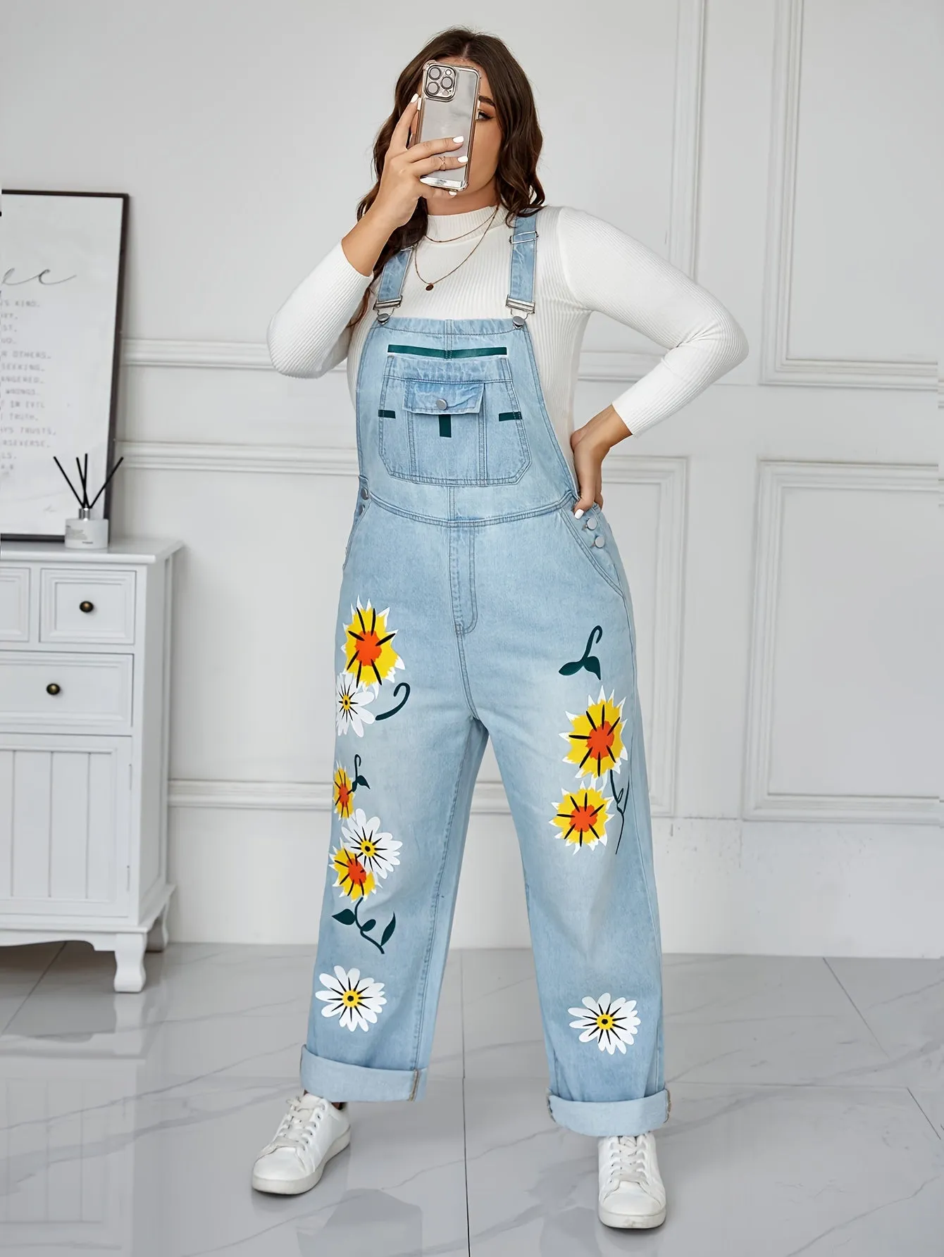 Playful dungarees with flowers in a denim look